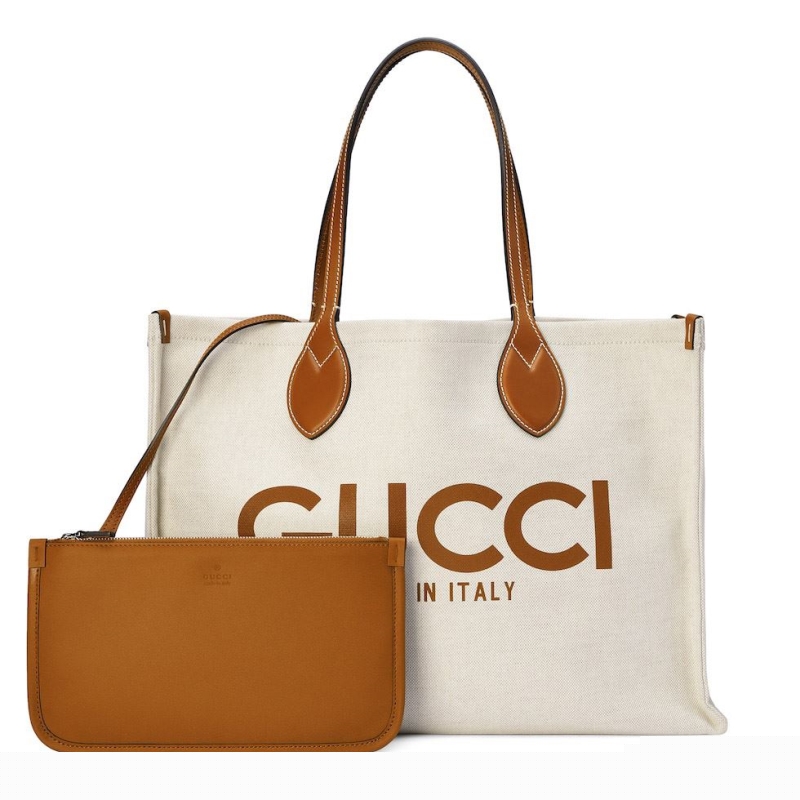 G*u*i shopping bags